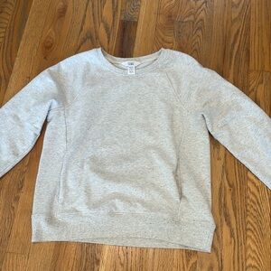 Athleta Girl Light Gray Sweatshirt size xl 14
Pockets and thumb holes